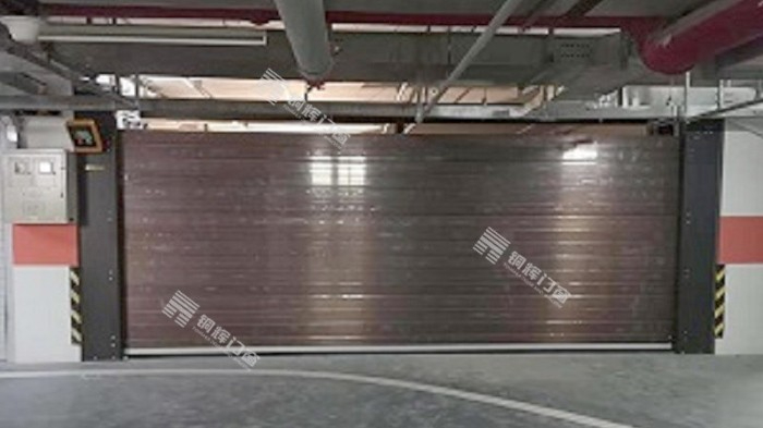 铜辉门窗-远洋天著别墅智能车库门卷帘门安装